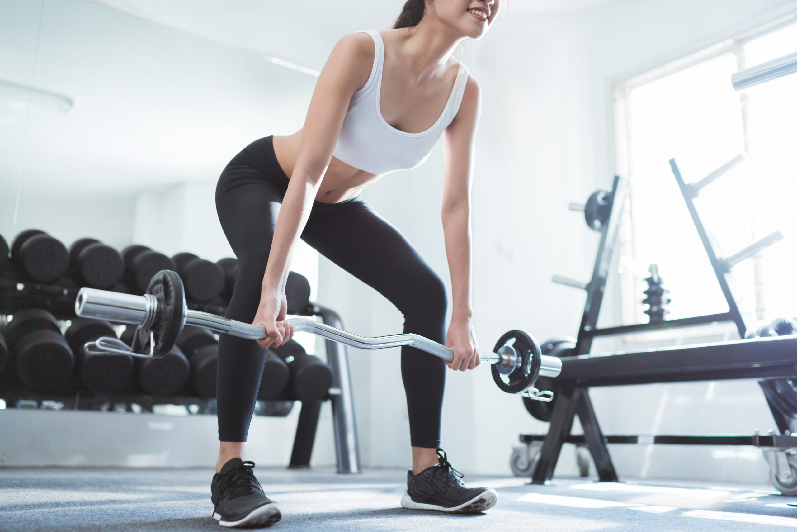 Asian,Woman,Exercising,In,The,Gym,,She,Was,Pretending,To